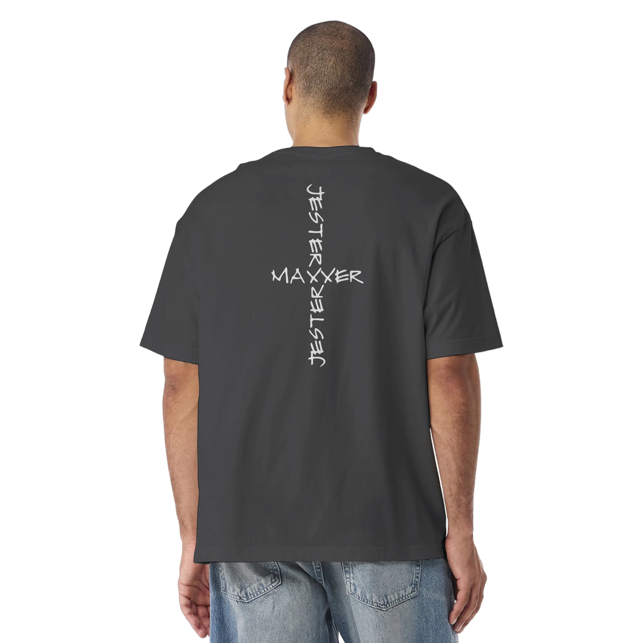 Model wearing grey JESTERMAXXING internet culture graphic t-shirt from behind